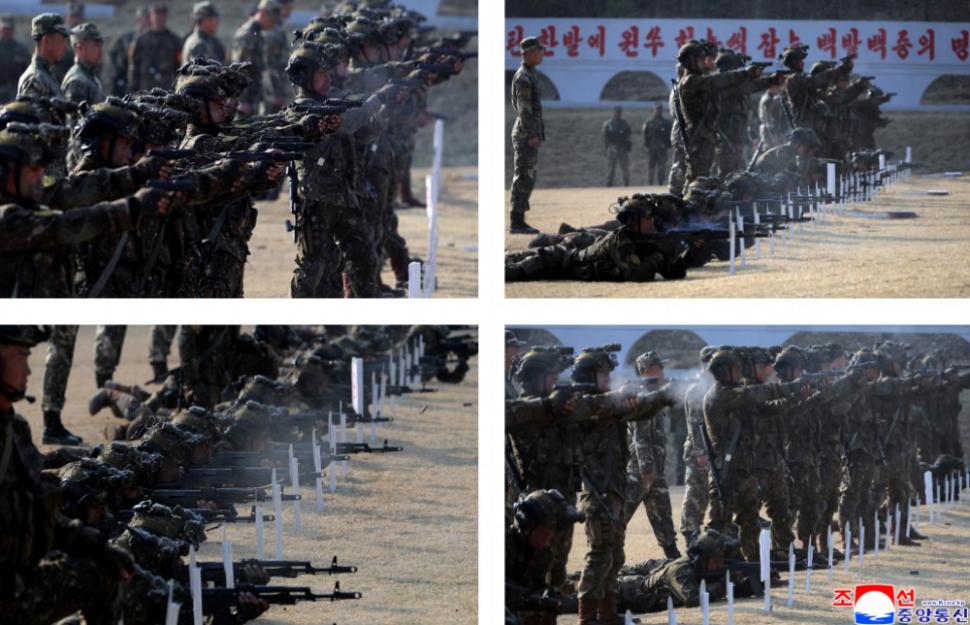 Kim Jong Un s-a distrat grozav urmărind cum soldații lui se lovesc cu baroase și târnăcoape ca să-i arate cât de antrenați sunt 1057994