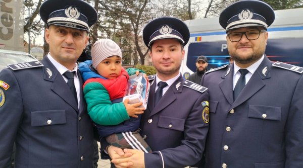 Aryan, întâlnire emoţionantă, de Ziua Poliţiei Române, cu poliţiştii care l-au găsit în pădure