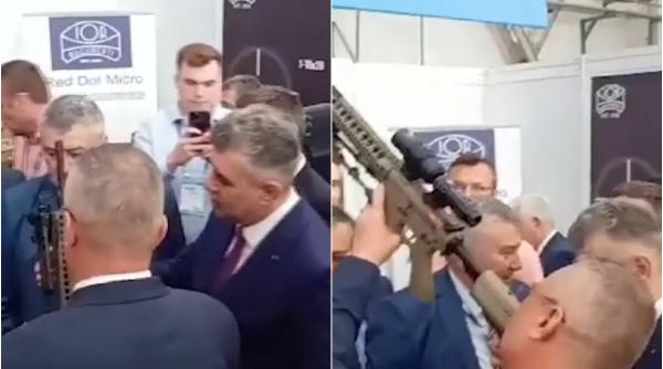 imagini nicolae ciuca marcel ciolacu cu arma in mana