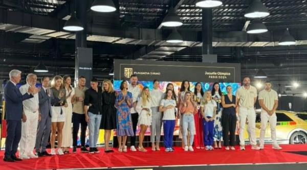 medaliatii de la paris au primit 22 de masini electrice de la ion tiriac cei cu doua medalii au primit cate doua autoturisme