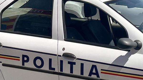 politist din sibiu retinut pentru 24 de ore este acuzat ca aflat in timpul liber a batut un sofer si i a lovit si masina