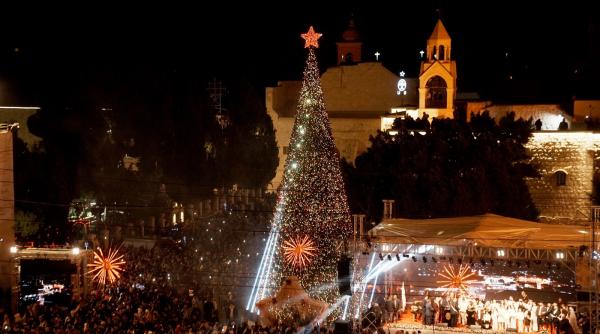 bradul de craciun din betleem a fost aprins pentru prima data de la inceputul razboiului ce spun oamenii despre atmosfera in oras