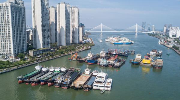 china mizeaza pe o insula de marimea belgiei ca sa schimbe comertul global firmele straine pot deschide conturi taxele sunt mai mici