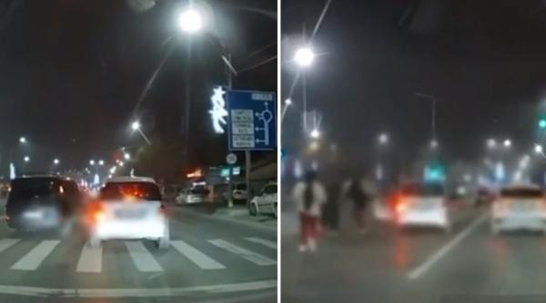 Un bărbat şi fiul său de 14 ani au fost reţinuţi după ce au bătut un şofer în urma unei şicanări în trafic. Al treilea bătăuş, căutat