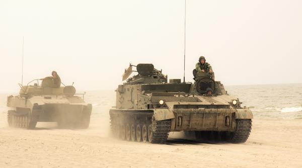 raportul conferintei de la munchen rusia ar putea ataca tarile baltice la doi ani dupa armistitiul din ucraina si un vecin in 6 luni