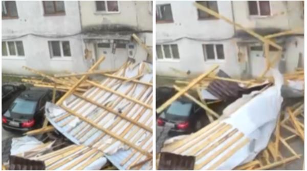 clipe dramatice in bistrita unde vantul puternic a smuls cu totul acoperisul unui bloc si l a aruncat peste masinile din parcare