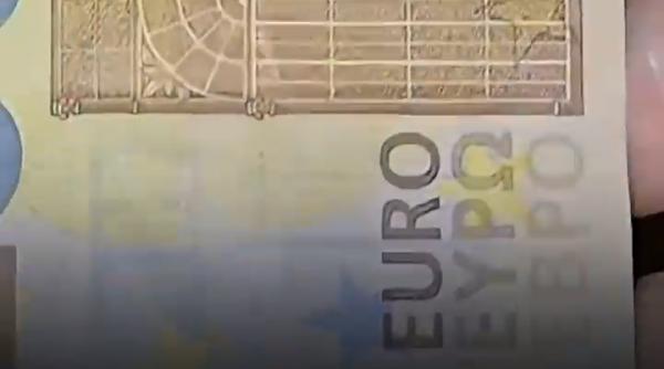 escroci prinsi dupa ce au cumparat telefoane mobile cu bani falsi