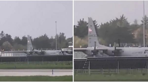 Un bărbat a fost arestat după ce s-a urcat pe o aeronavă militară americană și a lovit-o cu pumnii. Momentele au fost filmate