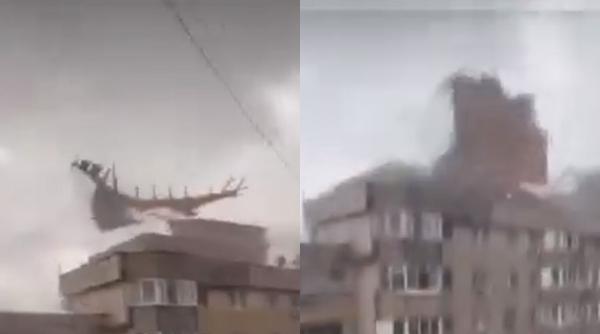 furtuna de cod rosu un acoperis a fost smuls de vant de pe un bloc si a cazut peste un om in dambovita