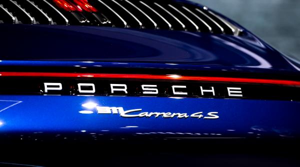 restructurare uriasa la porsche 9 000 de angajati vor pleca din companie