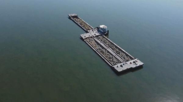 dunarea scade cu 2 cm pe zi misiune contratimp la cernavoda pentru salvarea centralei barjele vor crea 2 praguri artificiale