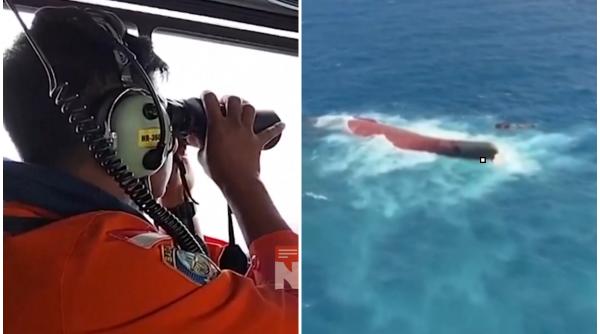 Sute de salvatori indonezieni caută 129 de persoane date dispărute după ce o navă de pasageri s-a răsturnat în Marea Java