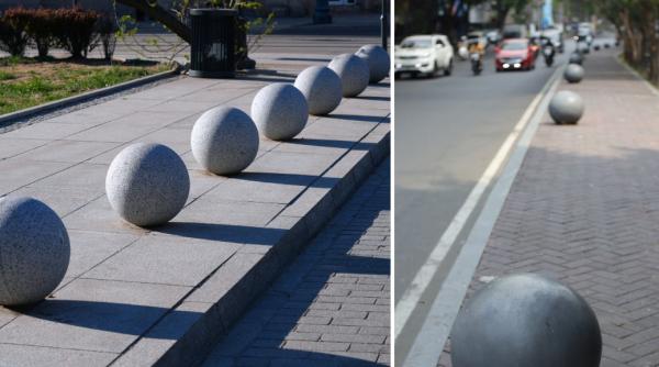 Sunt peste tot, însă, puţini oameni ştiu rolurile lor. Motivele pentru care sunt amplasate sfere de beton pe trotuare