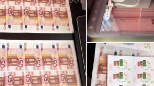 Fabrică de bani falşi, descoperită într un sat din Suceava. Suspecţii prinşi cu 1.2 milioane de euro la ei