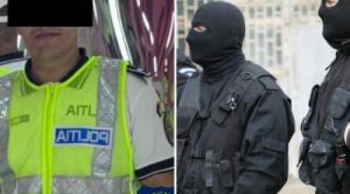 Poliţistul "model" de 22 ani care îşi înregistra şefii, suspectat de viol. Percheziţii la locuinţa mamei lui