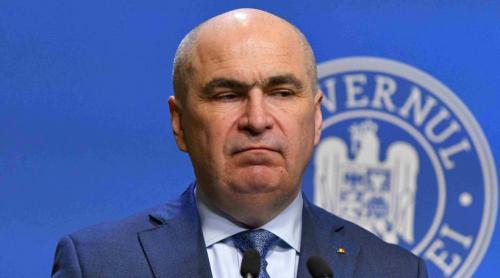 Incredibil! După ce a fost demis de Parlament, Bolojan a înființat o comisie guvernamentală care să elaboreze legi. Sub conducerea Oanei Gheorghiu