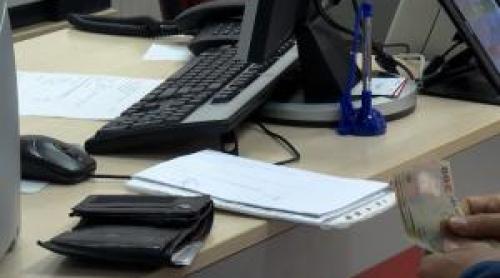 A venit motivarea în dosarul "Cartelul Băncilor". Românii şi ar putea recupera banii plătiţi în plus