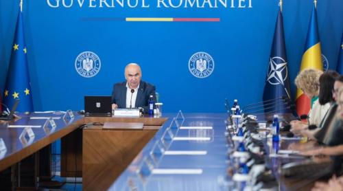 În plină criză a spitalelor, Bolojan mărește salariile în firma lui Fritz