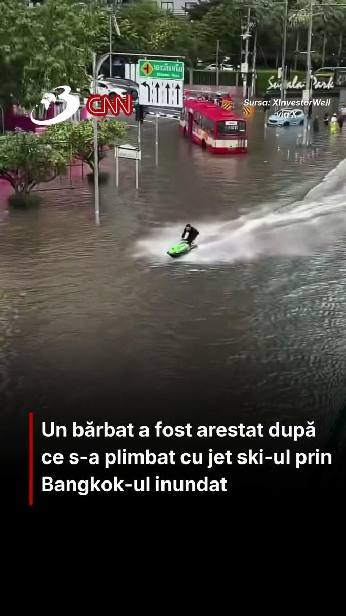 Un bărbat a fost arestat după ce s-a plimbat cu jet ski-ul prin Bangkok-ul inundat