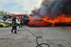 Incendiu uriaş în parcul auto al Regiei de Transport din Craiova. Patru autobuze şi 11 maşini, distruse 704397
