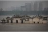 Nou bilanț al inundațiilor din China: 33 de morţi şi 8 dipăruţi 718128