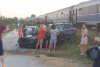 SUV izbit violent de un tren cu călători, în comuna 23 August, Constanța: Pasagerii din mașină, răniți 724330