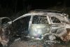 O maşină care a încercat să evite un mistreţ a fost proiectată de un Land Rover într-un pom şi a ars complet 724763