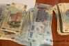 Teancuri de bani găsite de ofiţerii DGA la medici şi asistente din Neamţ şi Iaşi, care vindeau certificate false de vaccinare 745219