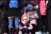 Imagini din gara disperării din Lvov | Mame cu bebeluşi în braţe imploră să fie luate în trenul salvării 753513