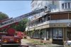 Un bloc din Slatina a fost cuprins de flăcări | Locatarii au fost evacuaţi cu scara 780819
