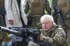 Boris Johnson a pus mâna pe armă, alături de militarii ucraineni 780899
