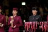 O stewardesă româncă a stat în spatele lui Emmanuel Macron și a ținut trofeul Cupei Mondiale, care i-a fost înmânat lui Messi 806351