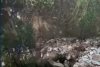 Zeci de sicrie şi urne au ajuns în râu după ce o parte dintr-un cimitir s-a prăbuşit, în Italia 811993