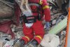 Salvatorii români au scos o familie de sub un bloc de nouă etaje prăbuşit la cutremur, în oraşul Antakya din Turcia 815683