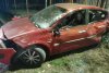 Un autotren încărcat cu fier vechi s-a răsturnat pe o şosea din Giurgiu. O maşină parcată în zonă a fost avariată 822483