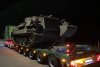 Un şofer român de TIR a fost prins de Poliţie în Germania când transporta un tanc deghizat în excavator 837371
