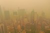 Oraşul New York, acoperit de o ceaţă portocalie. Oamenii, obligaţi să poarte măşti de protecţie 839009