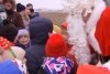 Moş Crăciun a ajuns, cu elicopterul, la Baza Aeriană 90 din Otopeni. Copiii au alergat bucuroși spre aeronavă, să îl întâmpine 875337