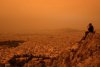 Imagini spectaculoase cu ceața portocalie care a înghițit Atena după furtuna de praf din Sahara 898990